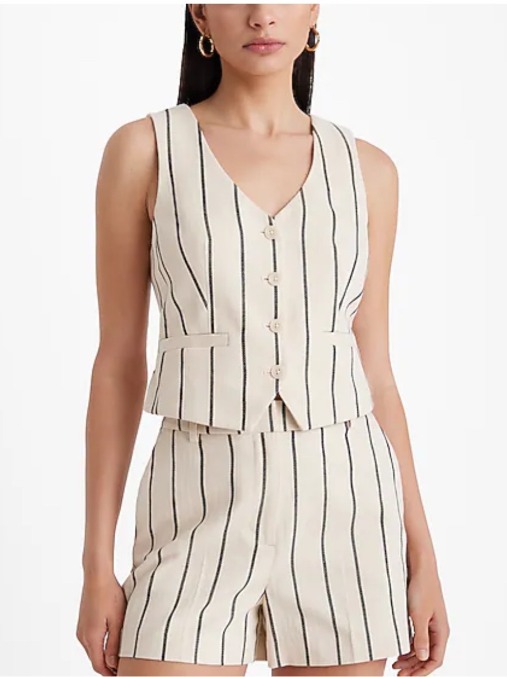 Express brand vest features a cream base w/black pinstripes and button-up front.